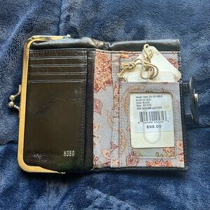 HOBO Alice compact wallet/clutch in black genuine leather.